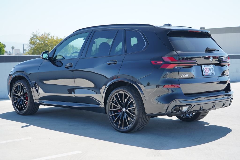 New 2026 Black Sapphire Metallic BMW sDrive40i image 7