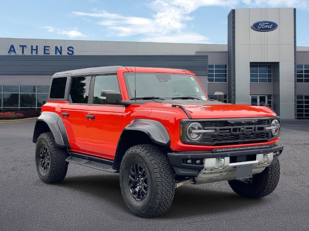 Certified Used 2023 Orange Ford Raptor image 1