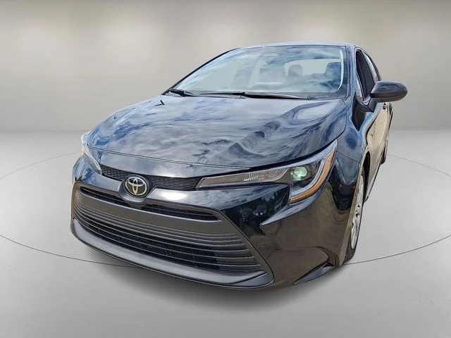 Used 2024 Black Toyota LE image 4