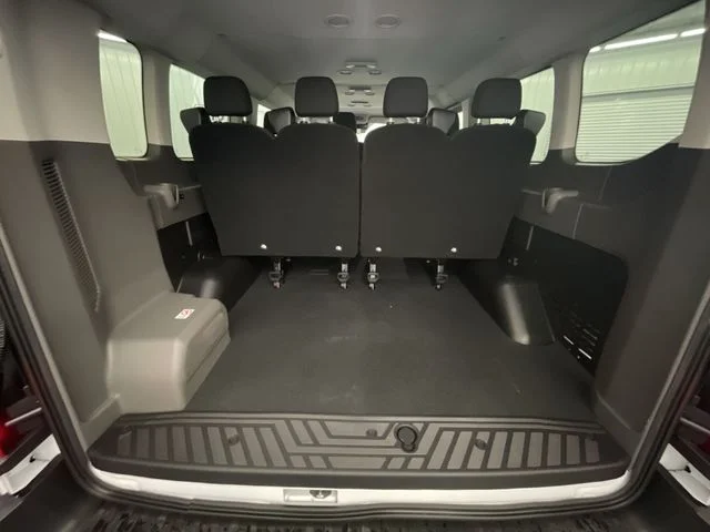 New 2026 Oxford White Ford Passenger Van XLT image 24