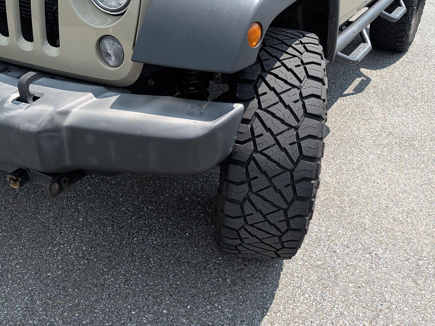 Used 2017 Gobi Clearcoat Jeep Rubicon image 1