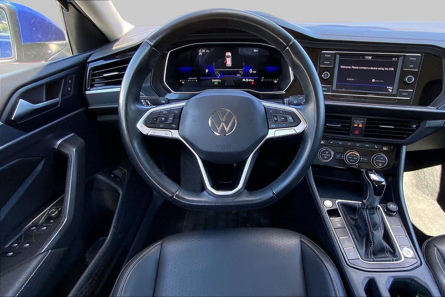 Used 2024 Rising Blue Metallic Volkswagen SE image 6