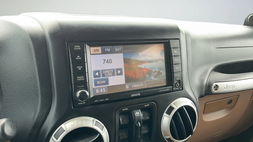 Used 2012 Black Jeep Unlimited Sahara image 11