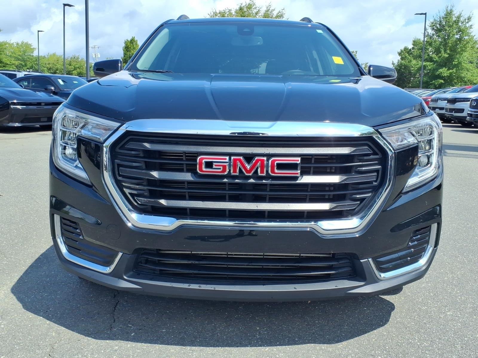 Used 2024 Ebony Twilight Metallic GMC SLE image 12