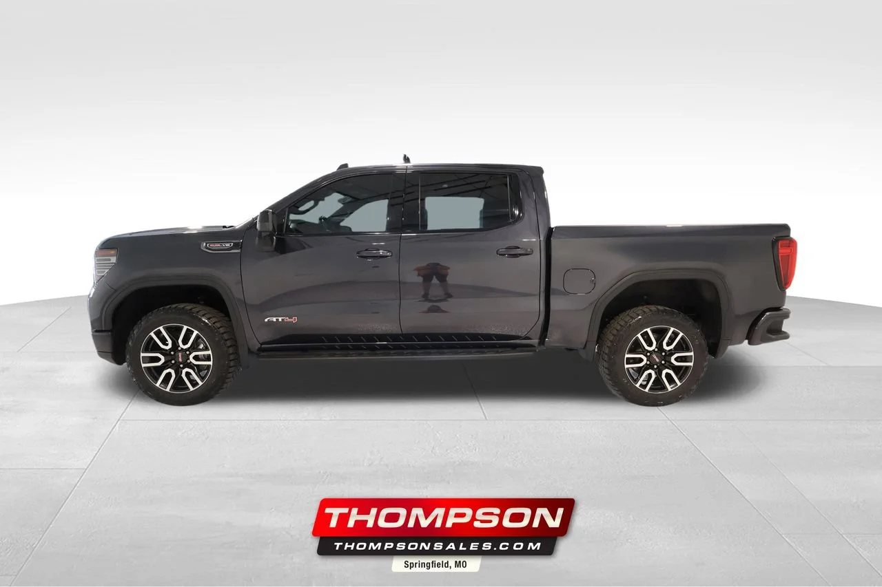 Used 2024 Titanium Rush Metallic GMC AT4 image 1