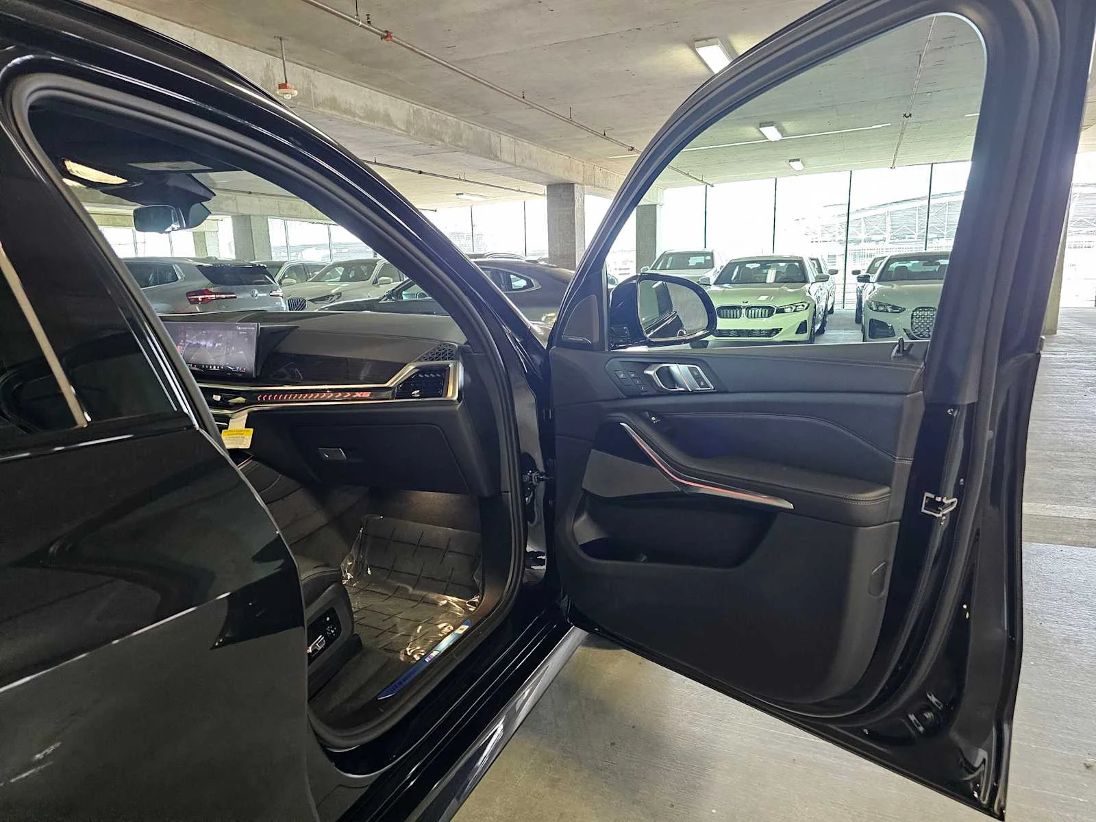 New 2026 Black Sapphire Metallic BMW xDrive50e image 40