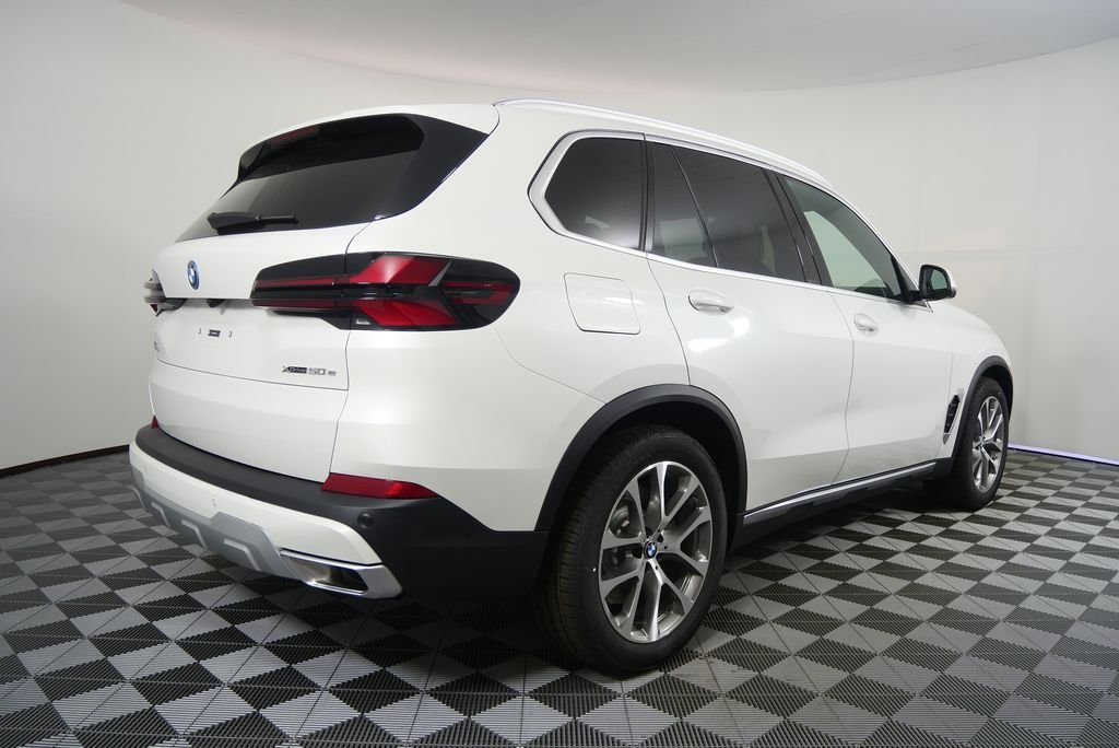 Used 2026 Mineral White Metallic BMW xDrive50e image 3