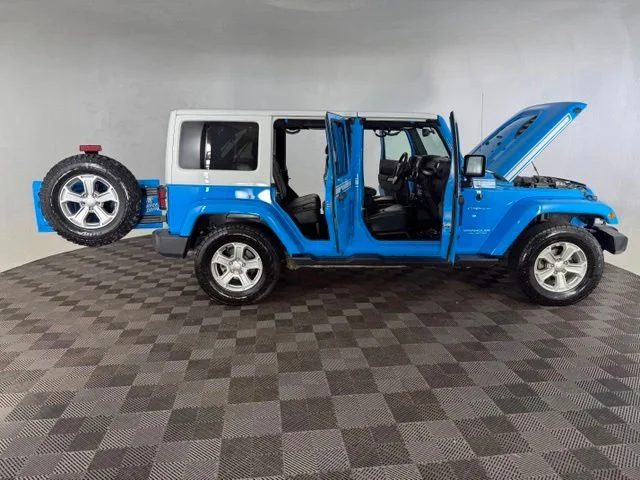 Used 2017 Blue Jeep Unlimited Sahara image 16
