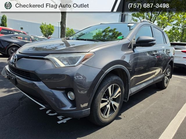 Used 2016 Magnetic Gray Metallic Toyota XLE image 1