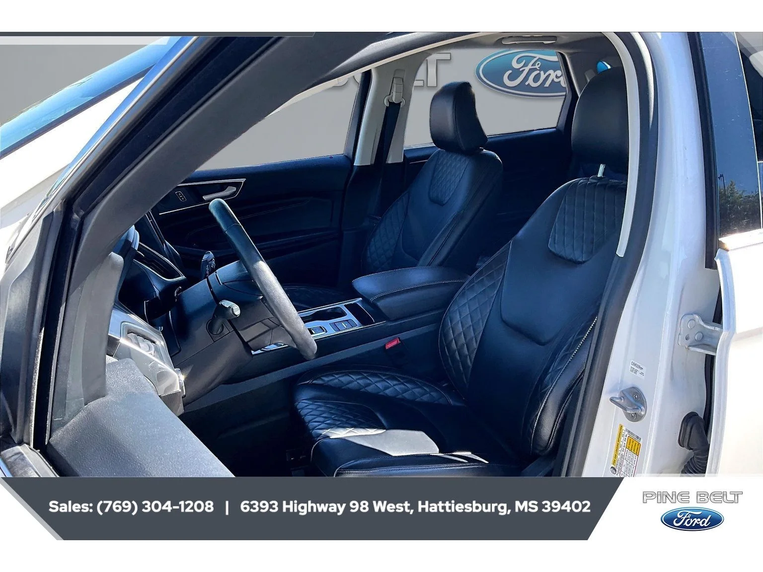 Used 2024 Star White Metallic Tri-Coat Ford Titanium image 18