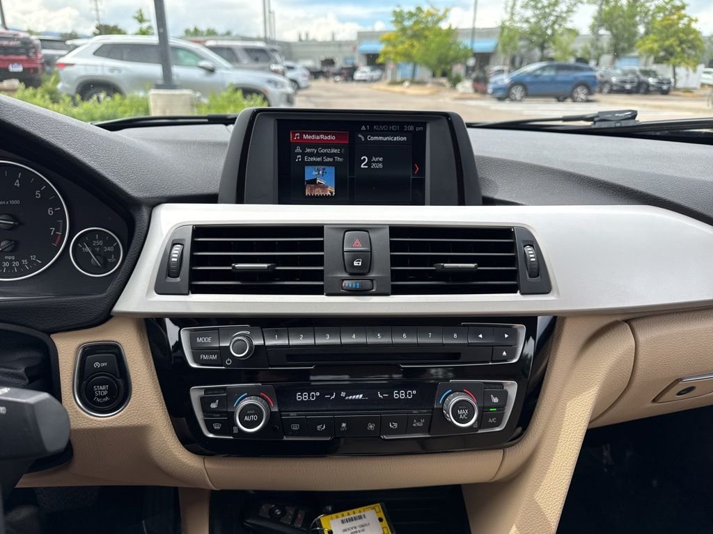 Used 2018 Black Sapphire Metallic BMW 320i xDrive image 17