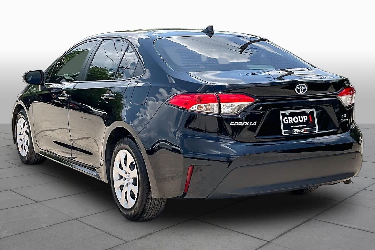Used 2025 Midnight Black Metallic Toyota Hybrid LE image 12