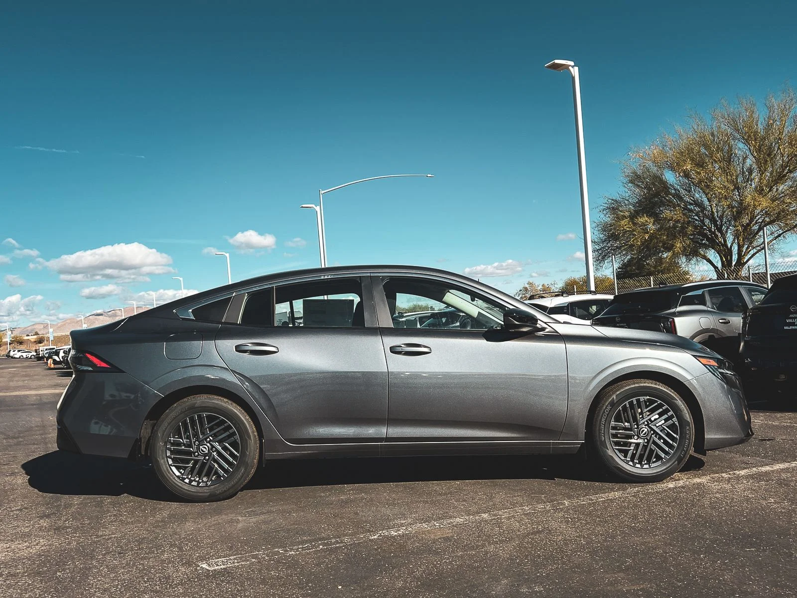 New 2026 Gun Metallic Nissan SV image 2