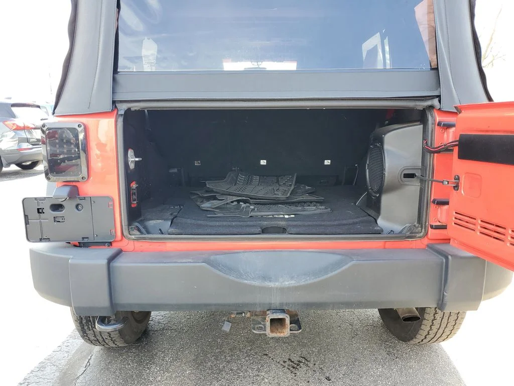 Used 2013 Red Jeep Unlimited Sport image 8