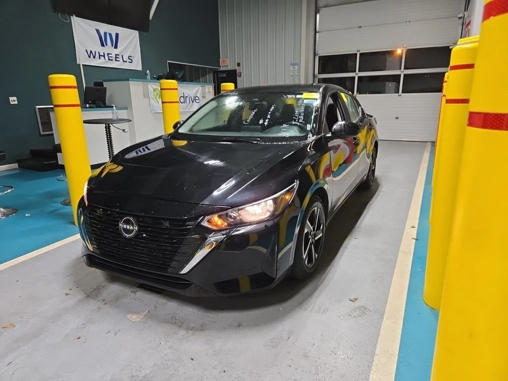 Used 2024 Black Nissan SV image 1