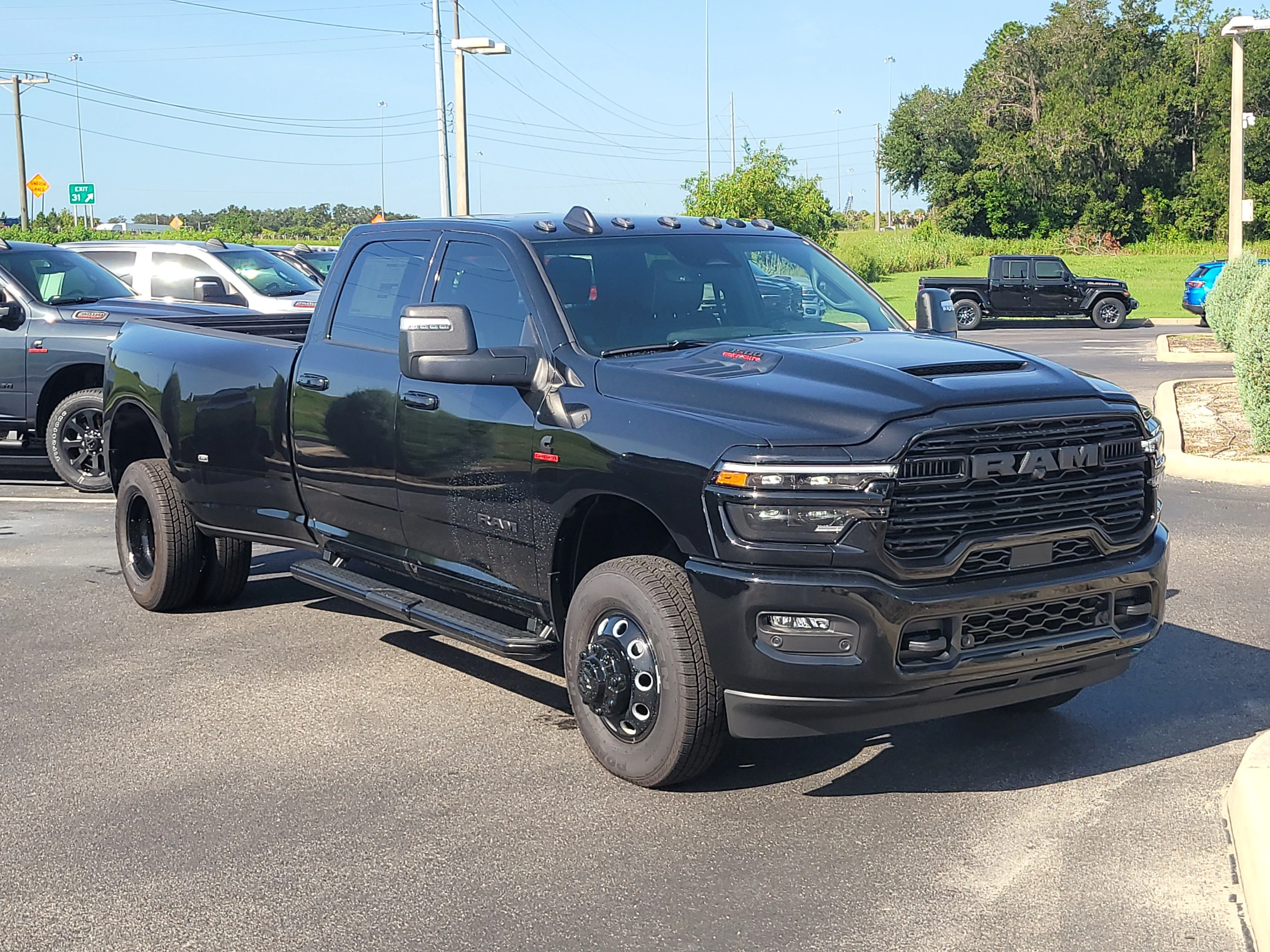 New 2026 Diamond Black Crystal Pearlcoat RAM Laramie image 1