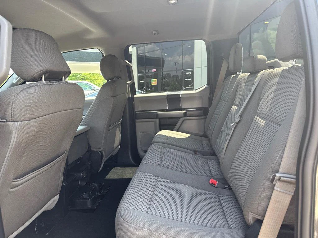 Used 2019 Magnetic Metallic Ford XLT 4WD Crew Cab 6.75 Box image 22