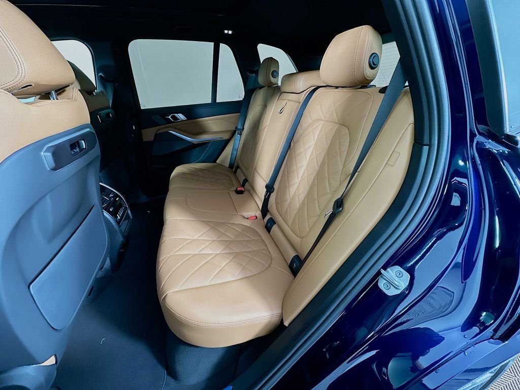 Used 2026 Tanzanite Blue II Metallic BMW xDrive50e image 17