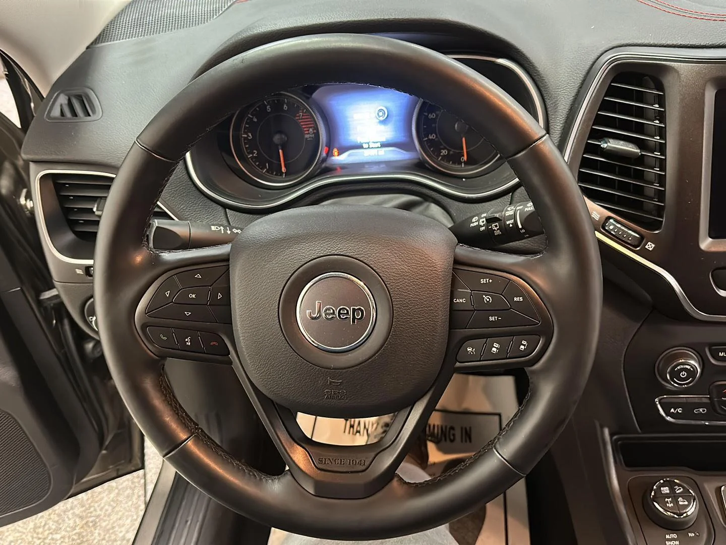 Used 2021 Olive Green Pearlcoat Jeep Trailhawk image 18