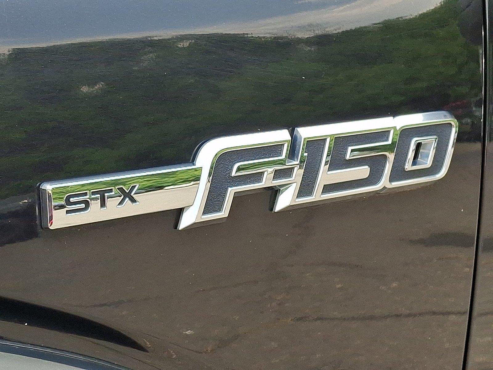 Used 2013 Tuxedo Black Metallic Ford STX image 27