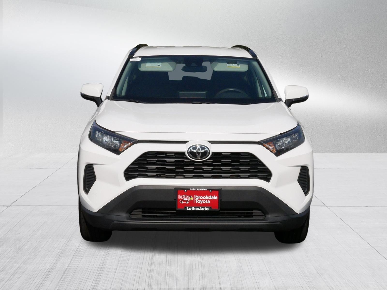 Used 2021 Super White Toyota LE image 2