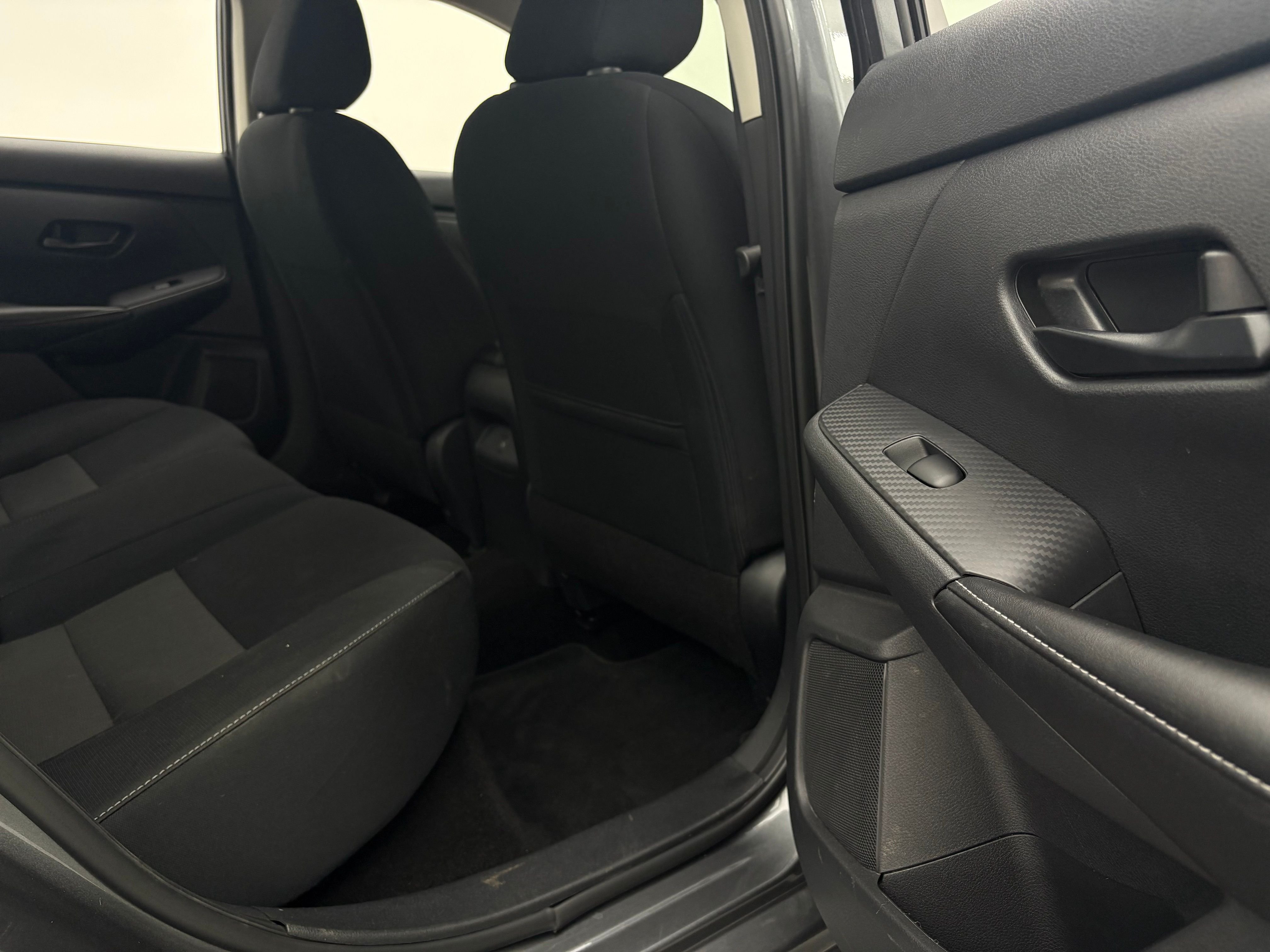 Used 2024 Gun Metallic Nissan SV image 31