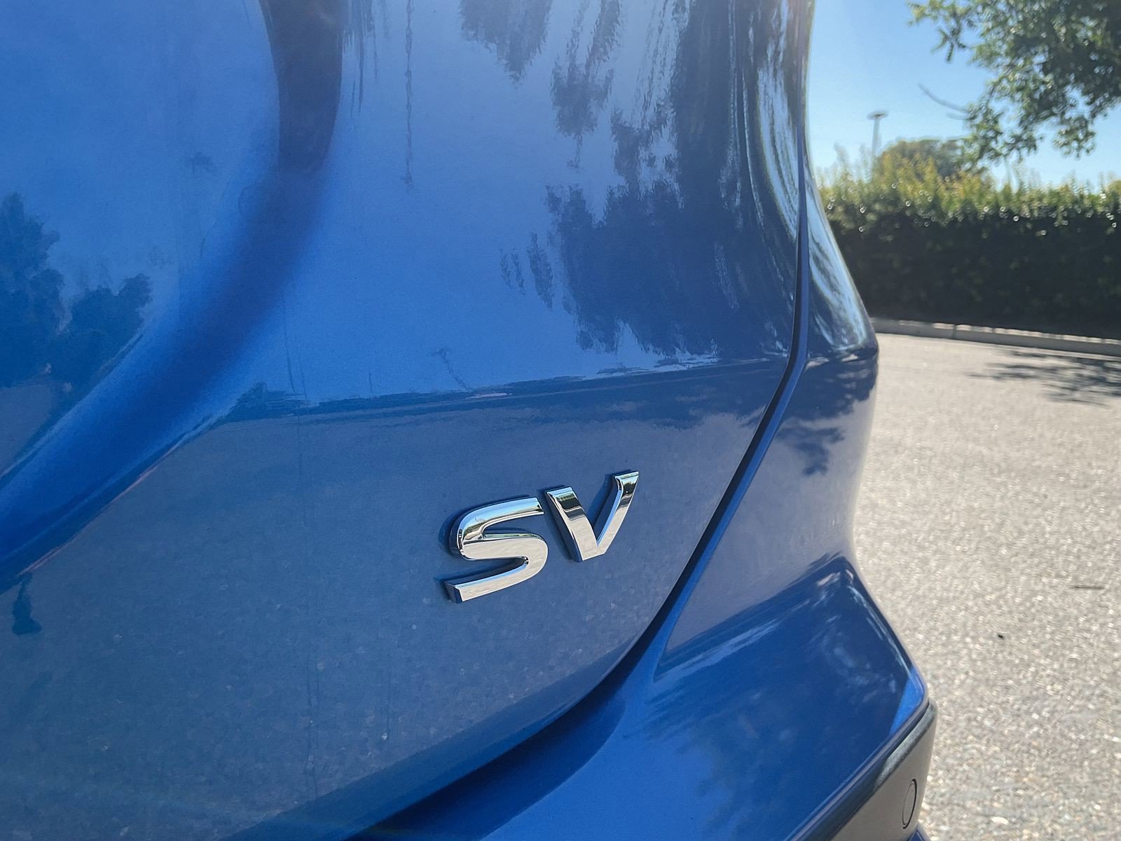 Used 2021 Electric Blue Metallic Nissan SV image 8