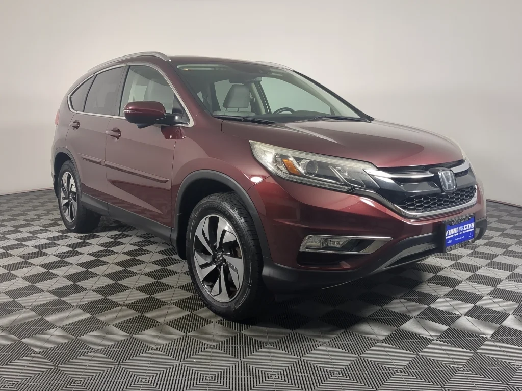 Used 2015 Honda CR-V Touring with VIN 5J6RM4H90FL042661 for sale in Champaign, IL