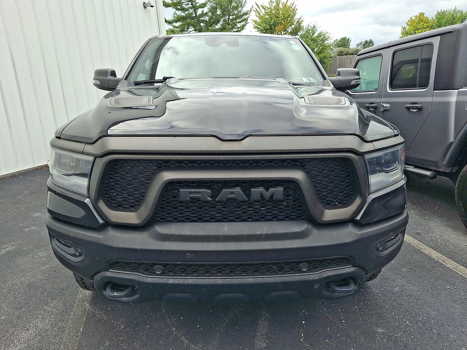 Used 2023 Diamond Black Crystal Pearlcoat Ram Rebel image 2