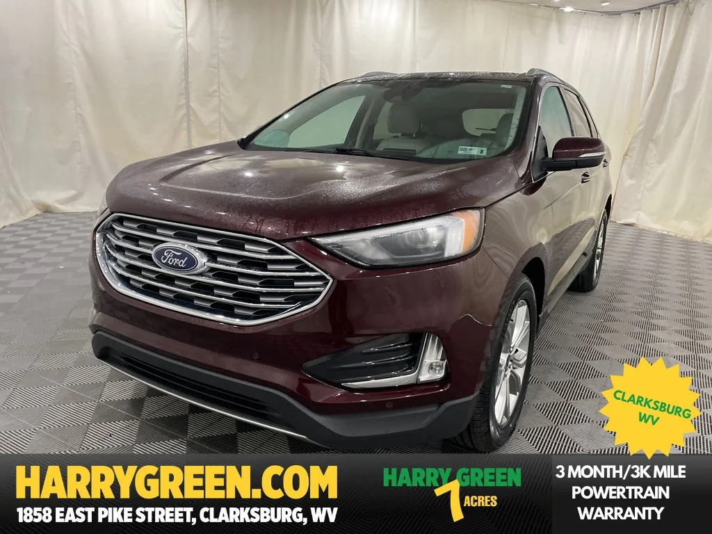 Used 2022 Burgundy Velvet Metallic Tinted Clearcoat Ford Titanium image 1