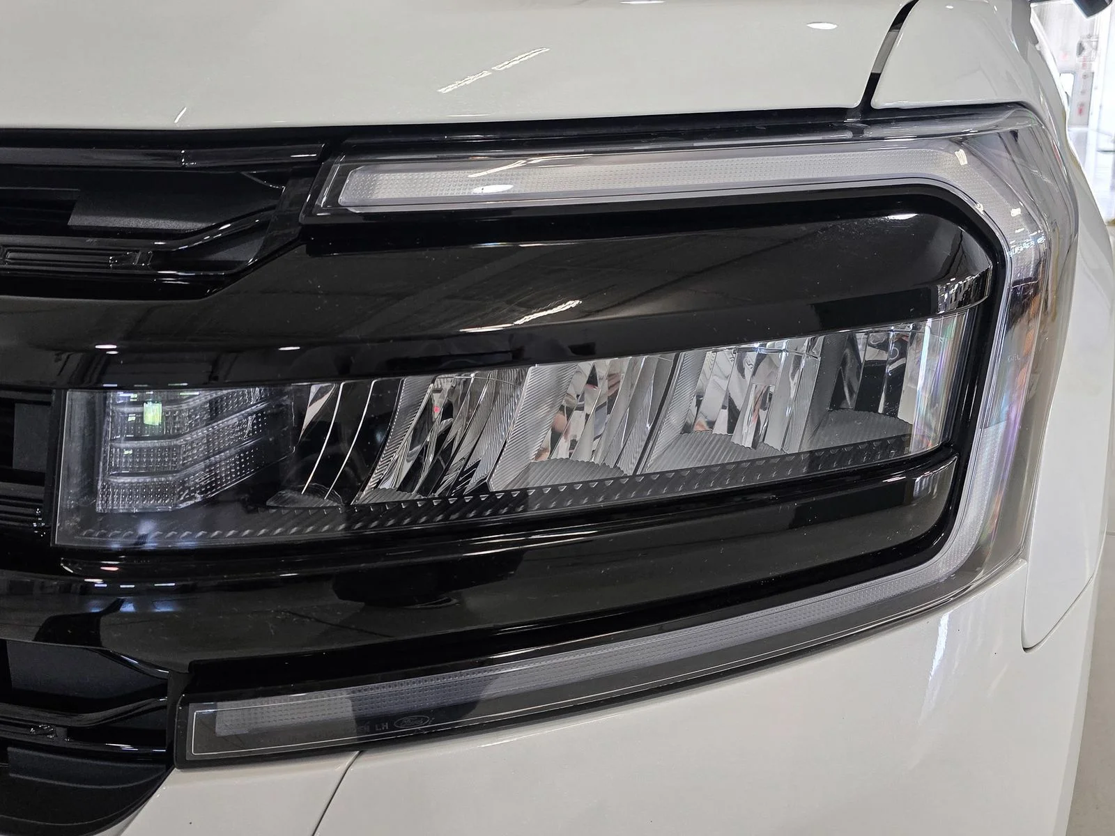 Used 2023 White Metallic Ford Limited image 14