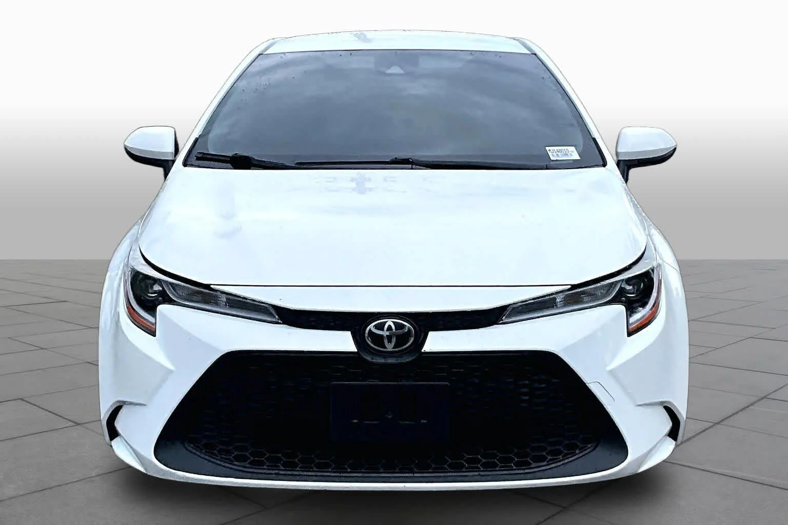 Used 2021 Super White Toyota LE image 4