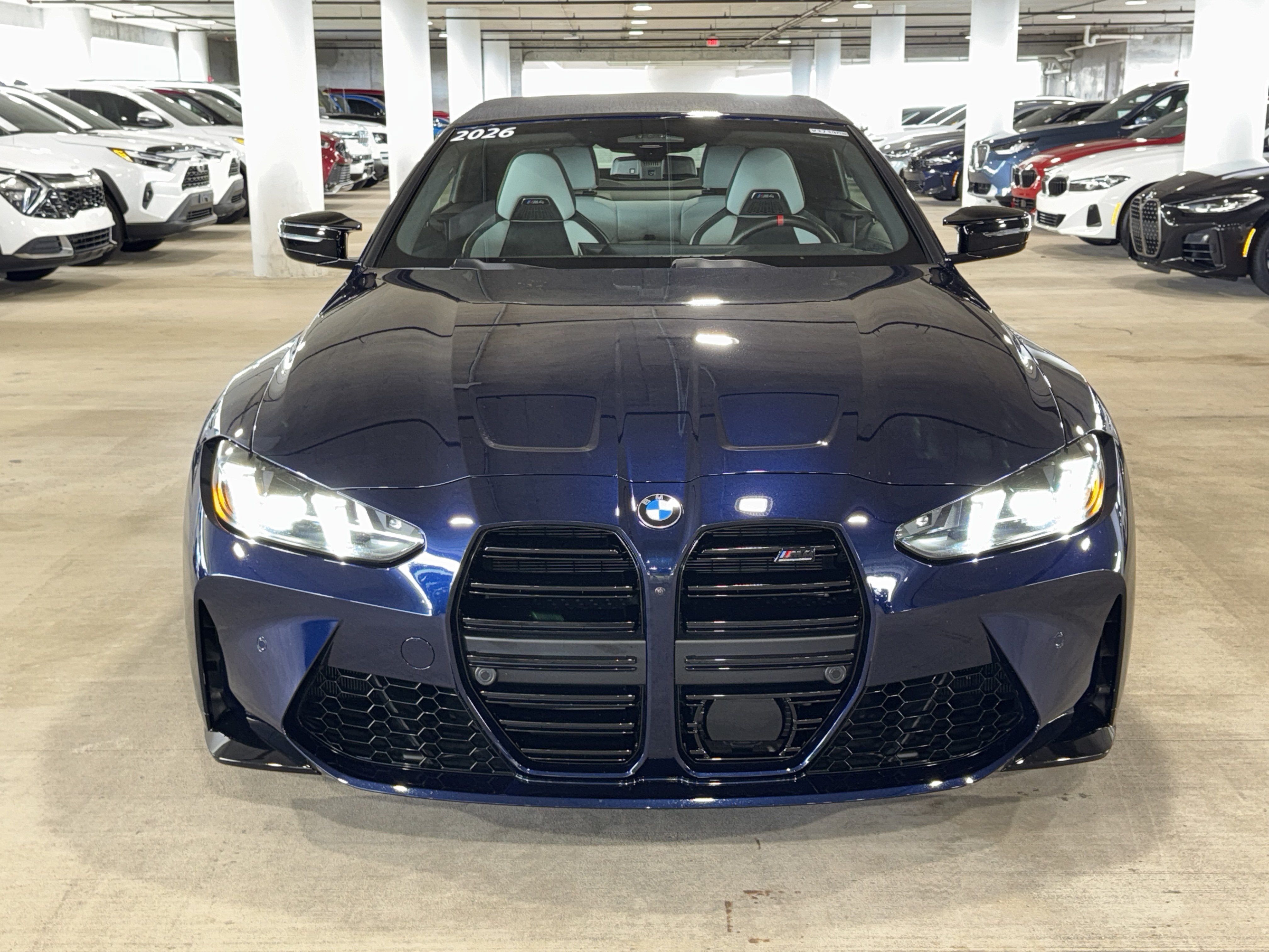 Used 2026 Tanzanite Blue II Metallic BMW Competition xDrive image 3