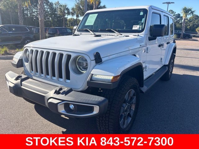 Used 2019 White Jeep Unlimited Sahara image 1