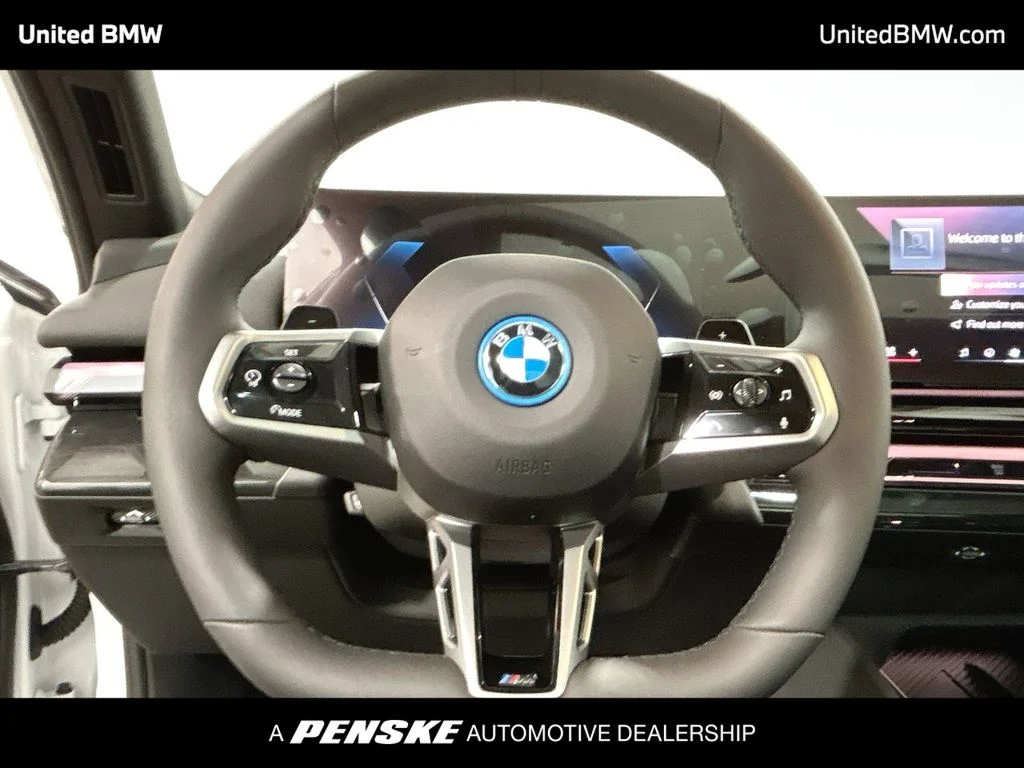 2026 BMW 5 Series 550e - Photo 14