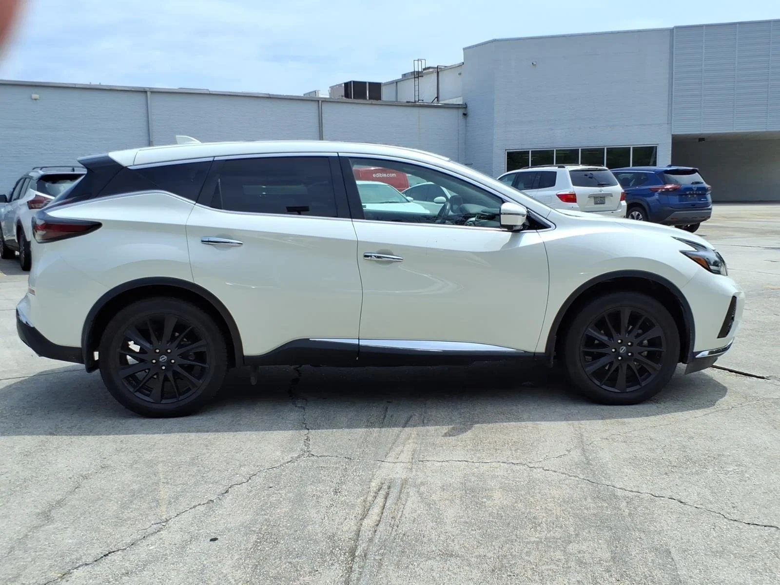 Used 2023 Pearl White Tricoat Nissan SL image 6