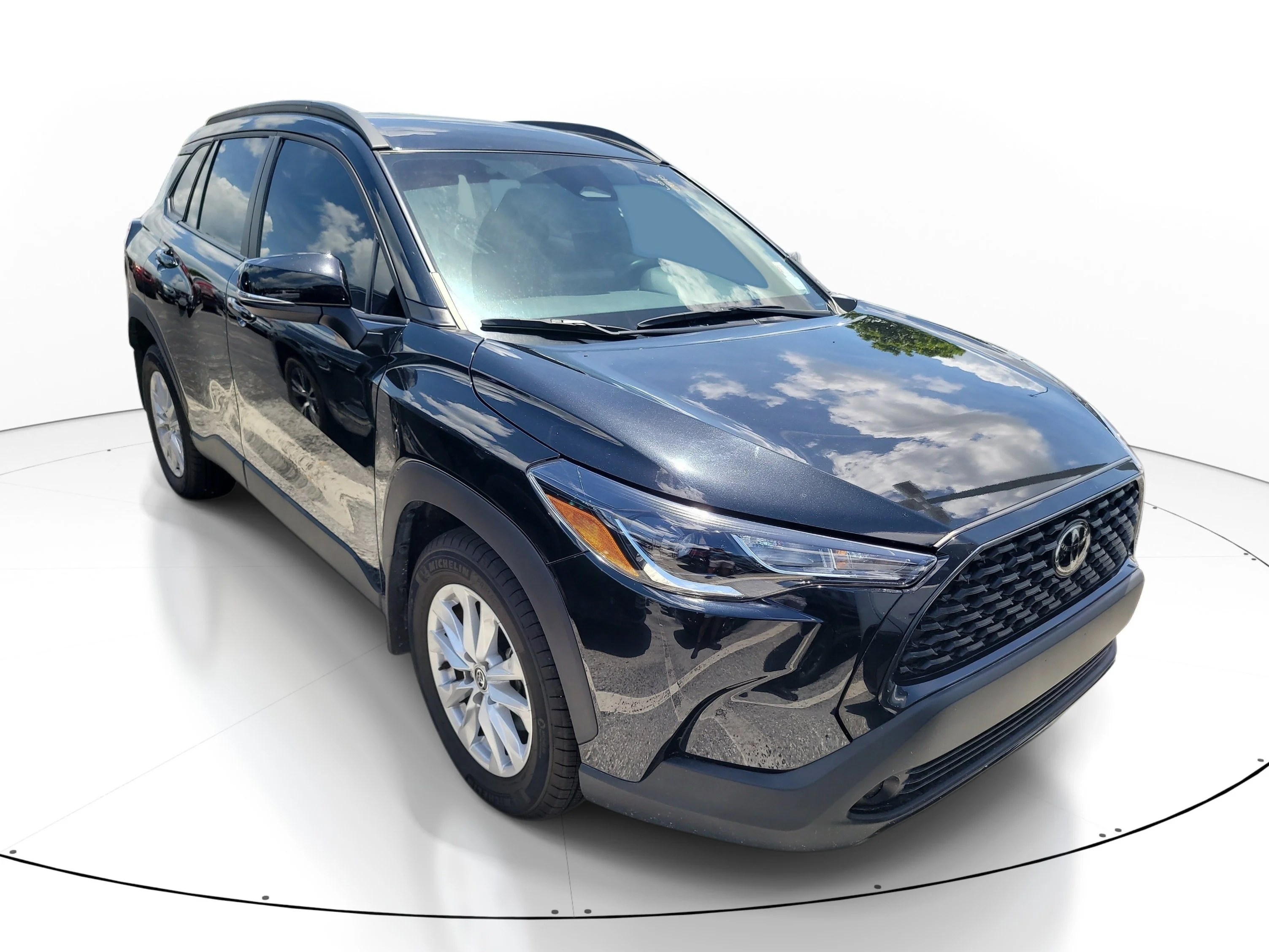 Used 2025 Jet Black Toyota LE image 1