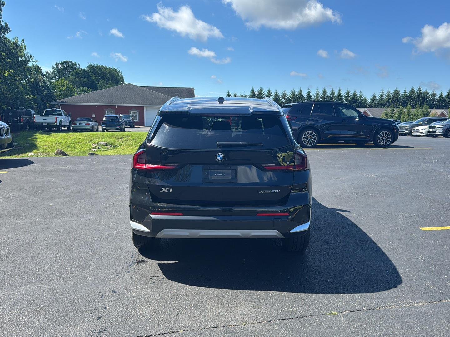 Used 2023 Black Sapphire Metallic BMW xDrive28i image 4