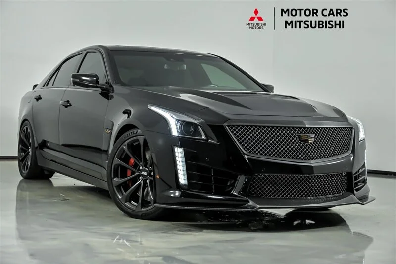 Used 2019 Black Raven Cadillac  image 1