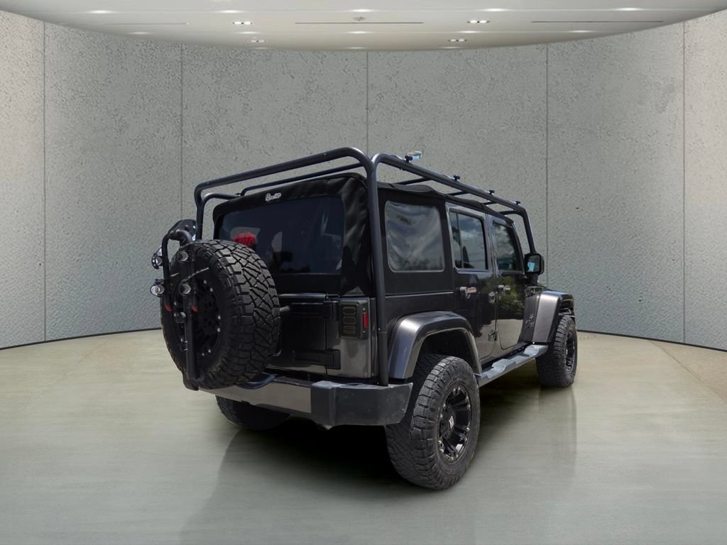 Used 2017 Granite Crystal Metallic Clearcoat Jeep Sahara image 4