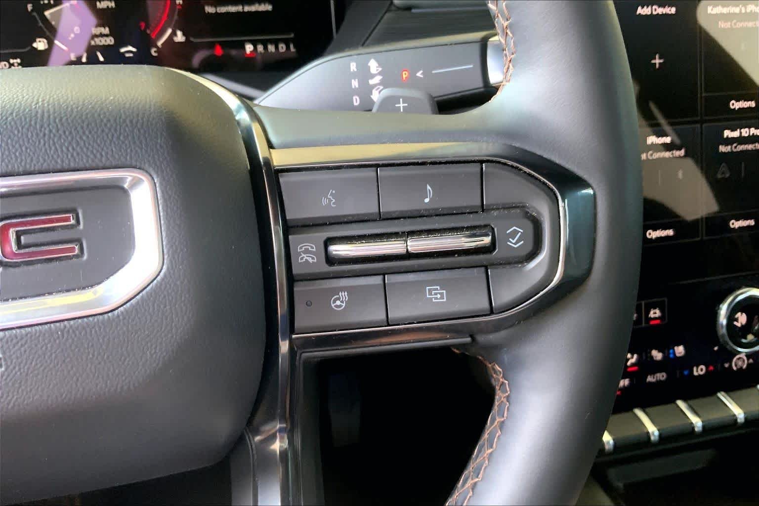 Used 2025 White Frost Tricoat GMC AWD AT4 image 24
