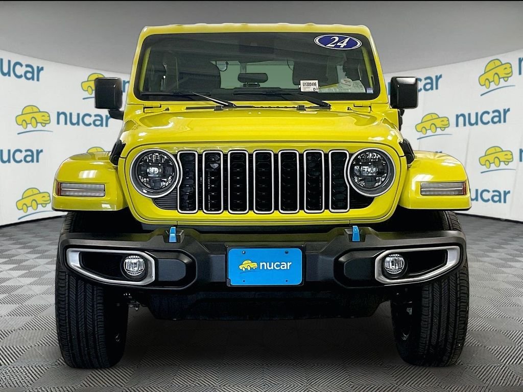 Used 2024 Yellow Jeep Sahara 4xe image 2