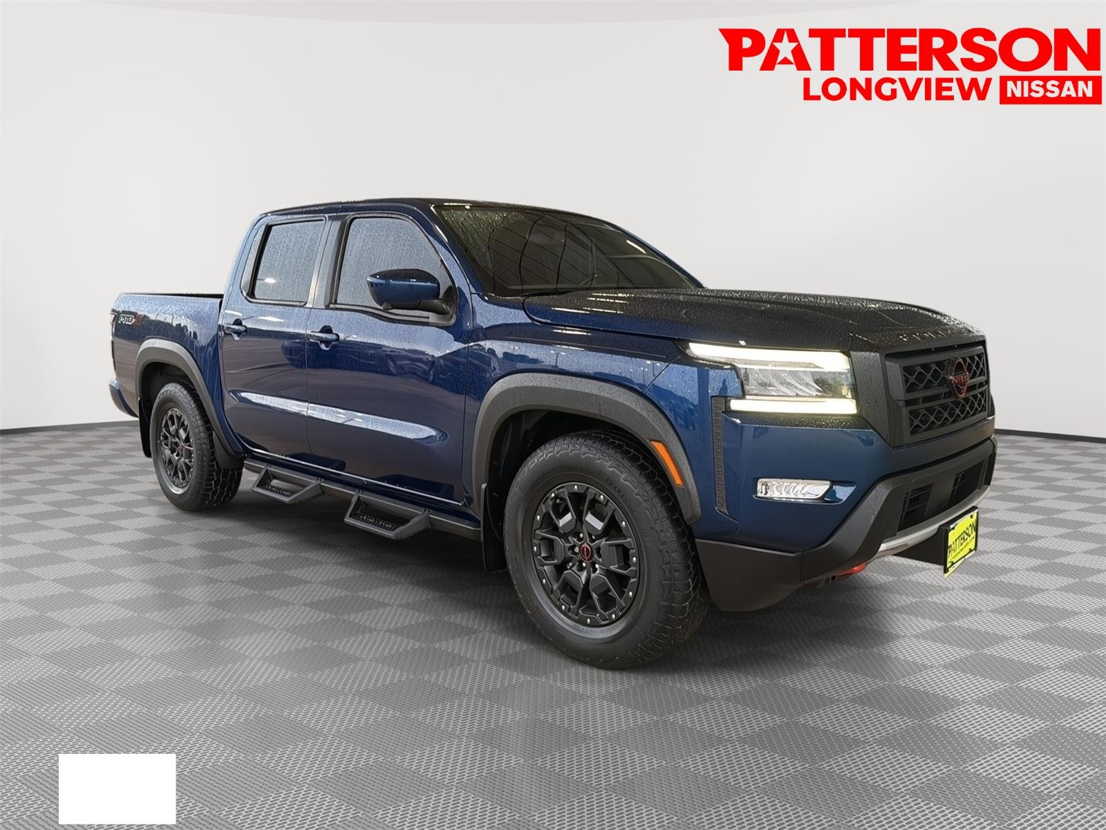 Used 2022 Deep Blue Pearl Nissan PRO-X image 1
