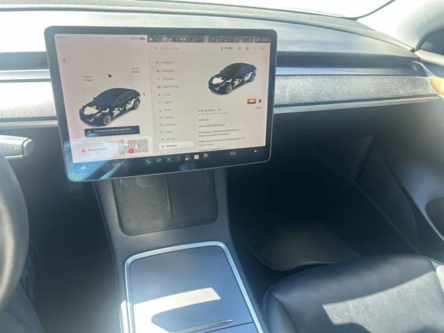 Used 2021 Solid Black Tesla Standard Range Plus image 11