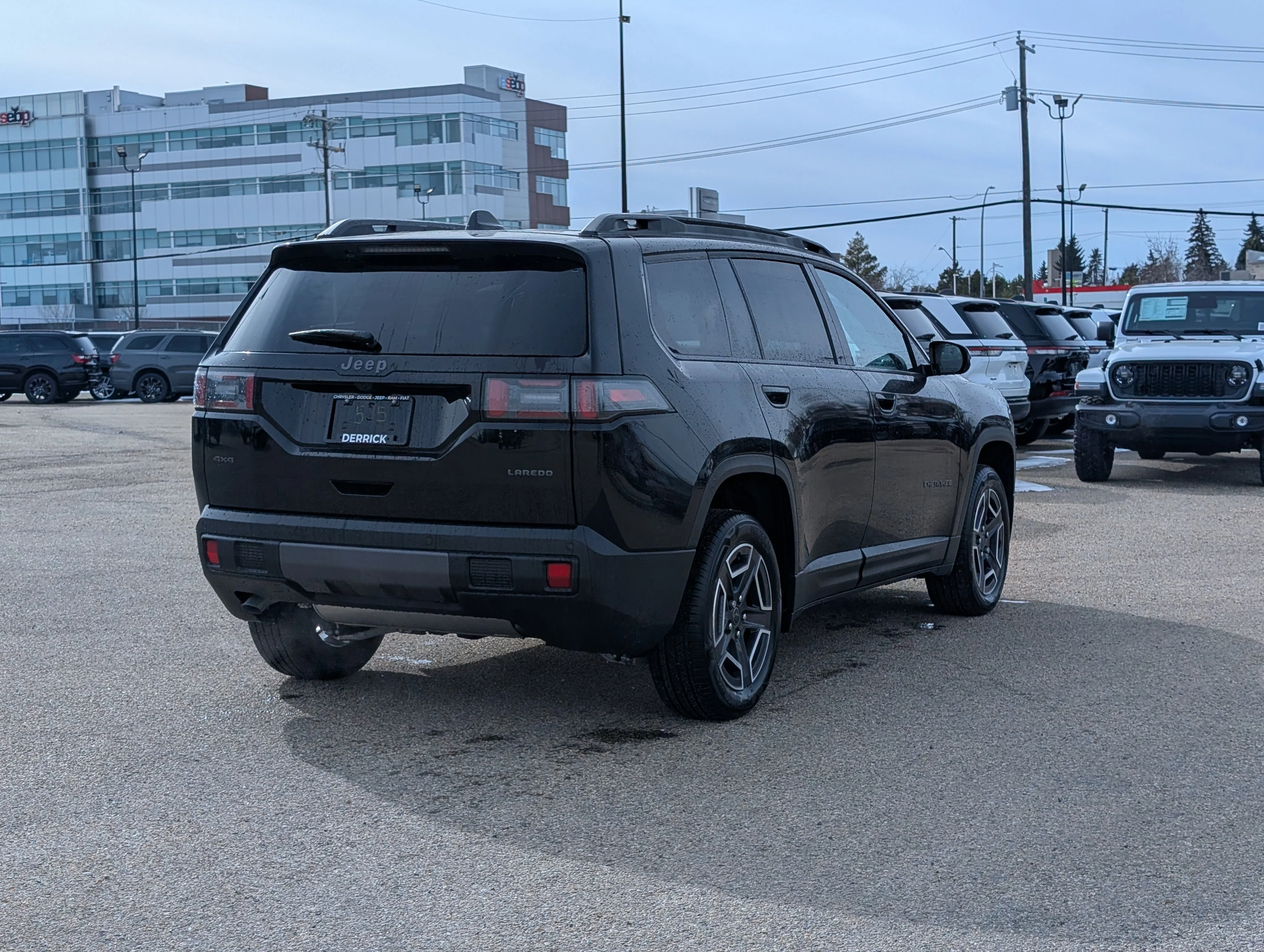 New 2026 Diamond Black Crystal Pearl Jeep Laredo image 7