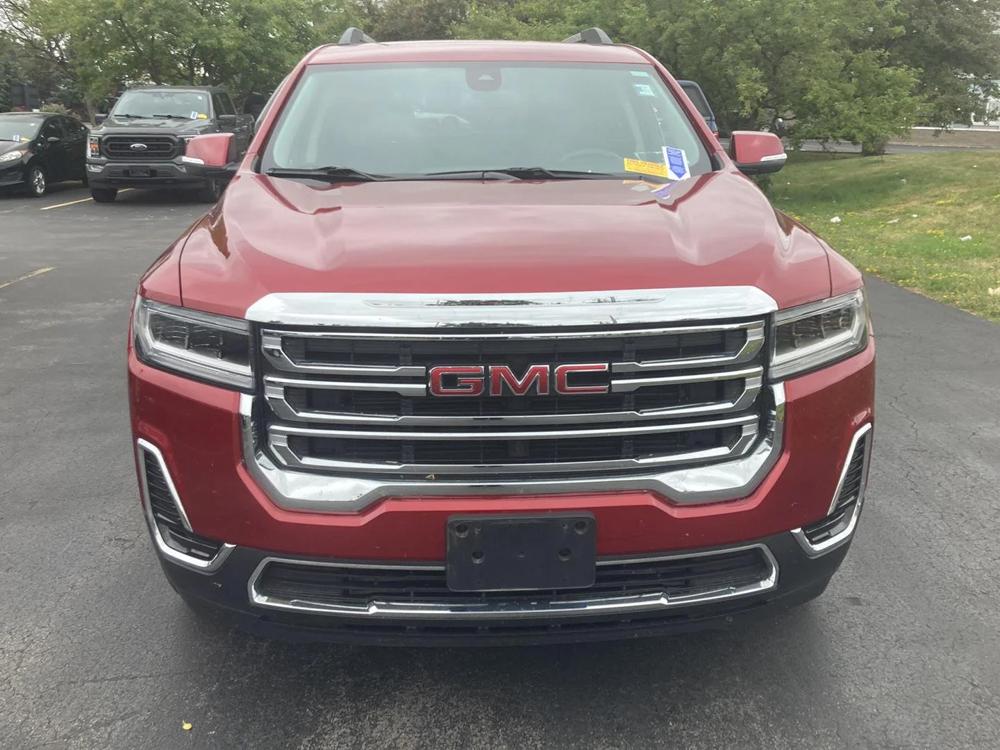 Used 2023 Volcanic Red Tintcoat GMC SLE image 2