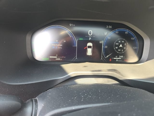 Used 2025 Cavalry Blue/Midnight Black Metallic Toyota Hybrid XSE image 2
