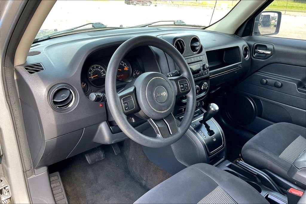 Used 2016 Maximum Steel Metallic Jeep Sport image 13