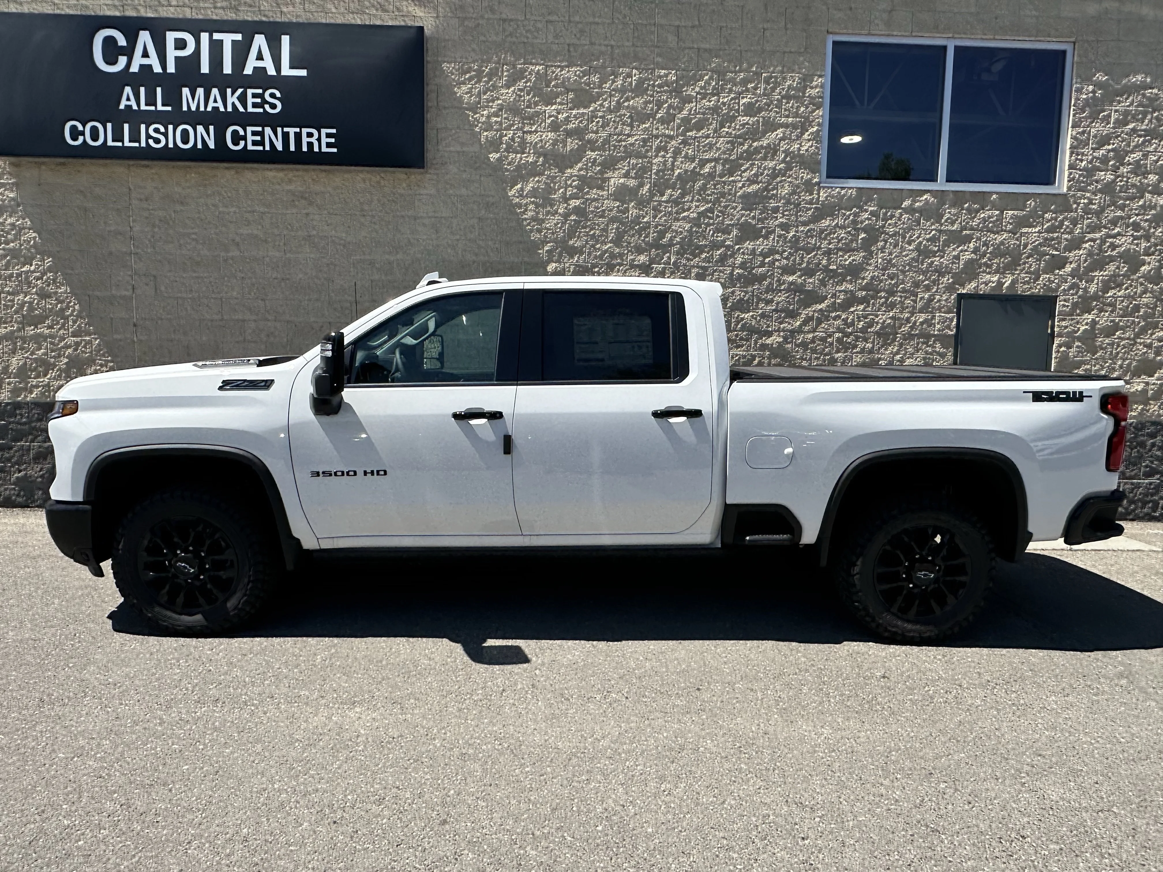New 2026 Summit White Chevrolet LTZ image 3