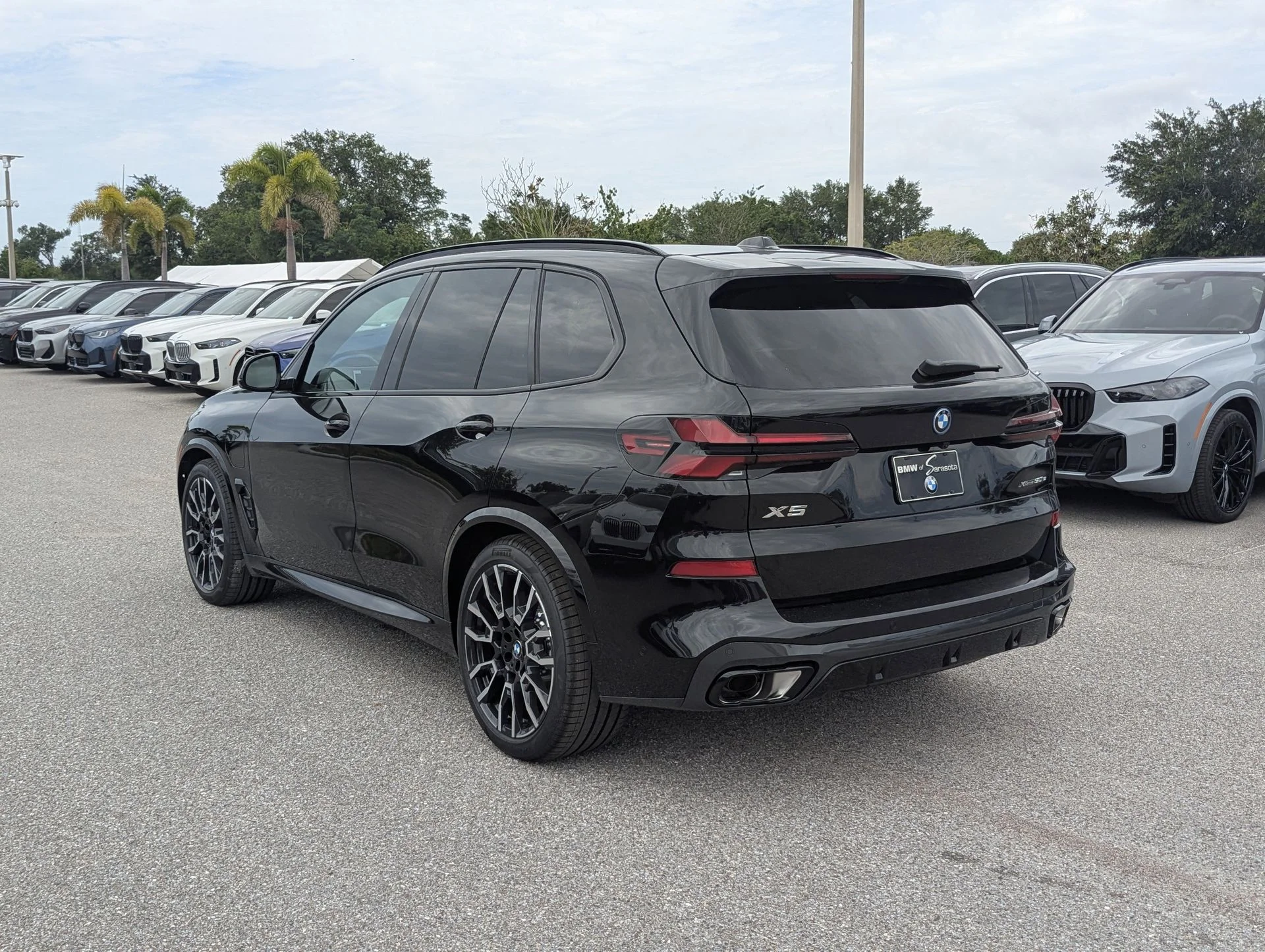 New 2026 Black Sapphire Metallic BMW xDrive50e image 5
